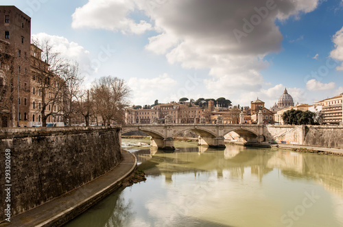 Rome, Italy, February 20, 2017 - view of Rome, Italy. Tiber River with bridges in Rome. Beautiful scenic panorama of Rome city. © lenaivanova2311