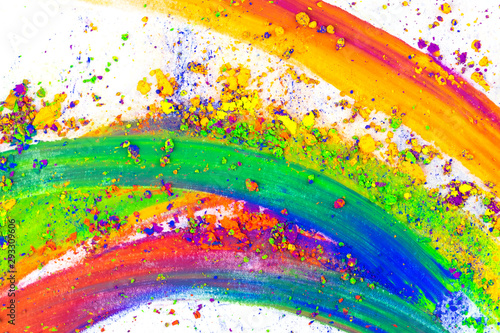 Natural colored pigment powder smeared on a sheet of white paper. Art concept .