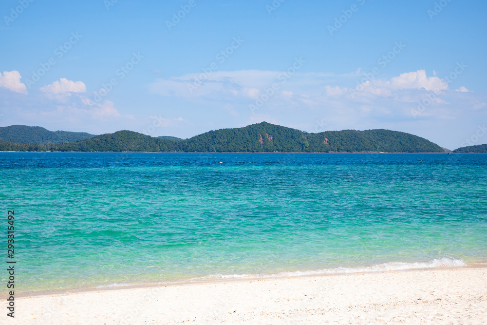 View of the turquoise water beach with light sand