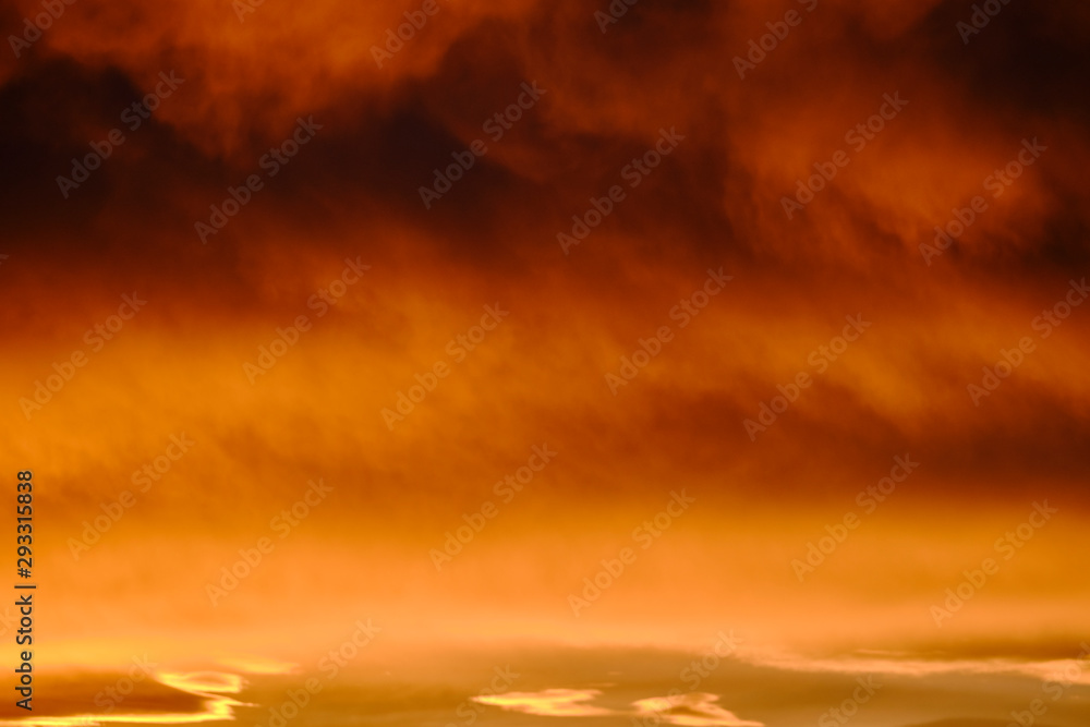 Fototapeta premium Clouds in the sky with burgundy color