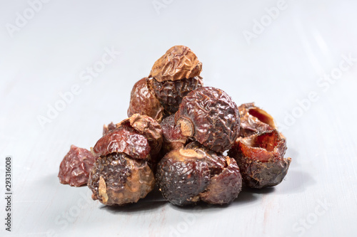 Wallpaper Mural soap nut closeup on a wooden table Torontodigital.ca