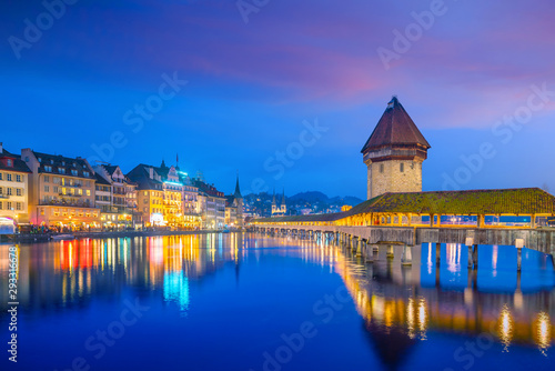 Historic city center of downtown Lucerne with  Chapel Bridge and lake Lucerne in Switzerland photo