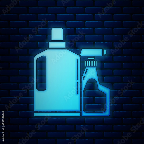 Glowing neon Plastic bottles for liquid laundry detergent, bleach, dishwashing liquid or another cleaning agent icon isolated on brick wall background. Vector Illustration