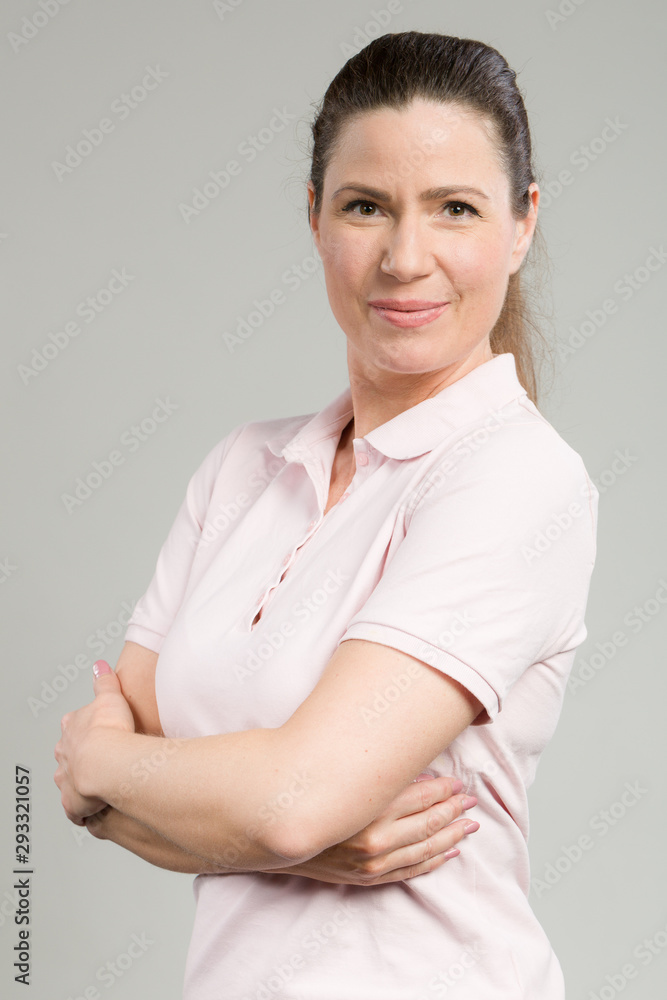 Mid age woman with wrinkles looks self confident Mid age woman with wrinkles looks self confident
