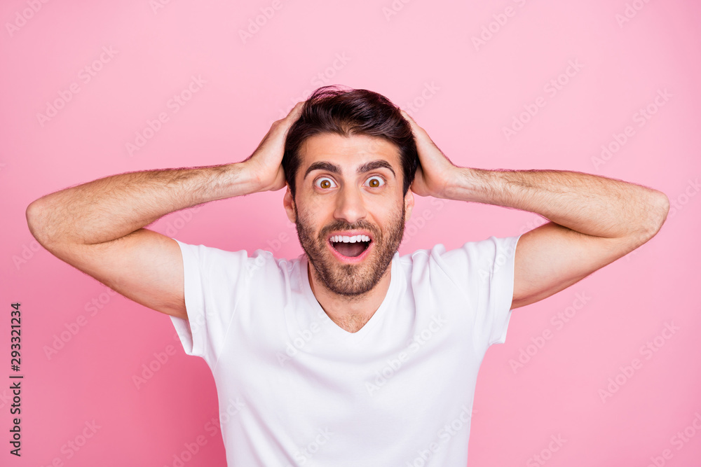 Omg black friday. Portrait of funny funky astonished expression middle eastern man touch his head hear incredible novelty scream wow wear stylish clothes isolated over pink color background Omg black friday. Portrait of funny funky astonished expression middle eastern man touch his head hear incredible novelty scream wow wear stylish clothes isolated over pink color background