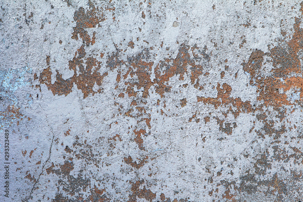 Texture of messy old cracked stone or cement wall in the sunlight for pattern, background. Cracked concrete wall as background. Selective focus old cracked stucco Texture of messy old cracked stone or cement wall in the sunlight for pattern, background. Cracked concrete wall as background. Selective focus old cracked stucco