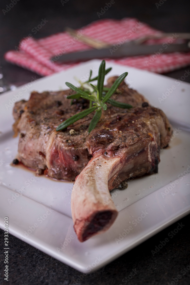 beautifully seared tomahawk steak, medium rare to rare beautifully seared tomahawk steak, medium rare to rare