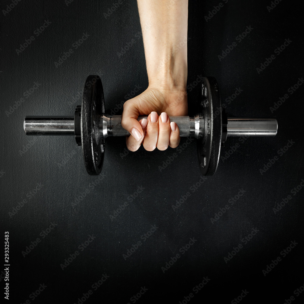 Woman hands in gym and black space Woman hands in gym and black space