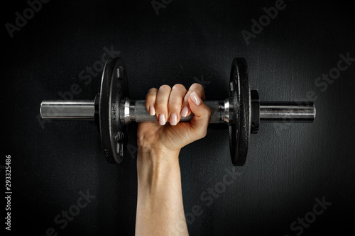 Woman hands in gym and black space 