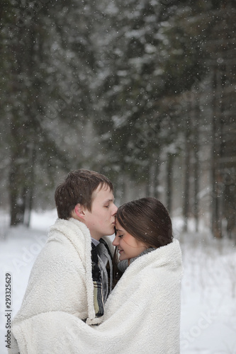 pair of lovers on a date winter afternoon in a snow blizzard © alexkich