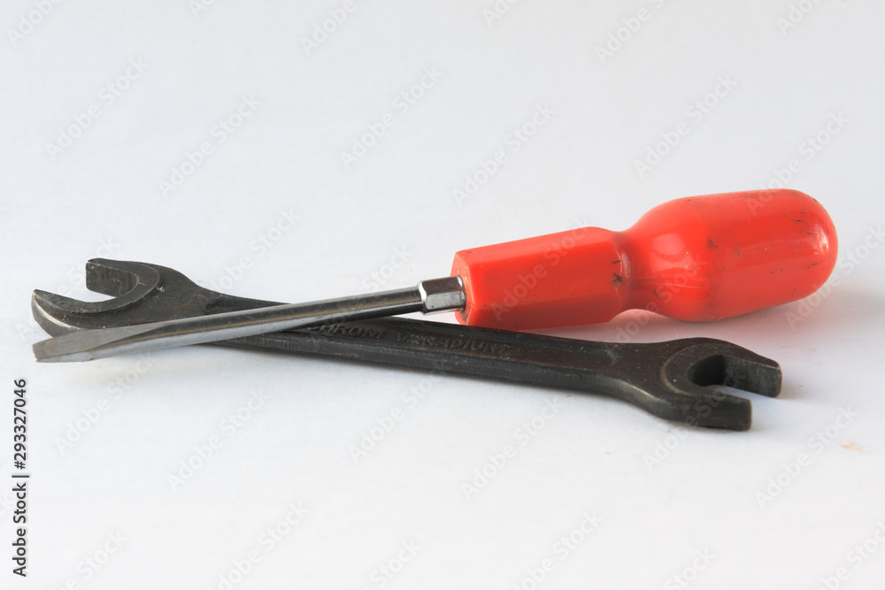 wrench and screwdriver on a white background wrench and screwdriver on a white background