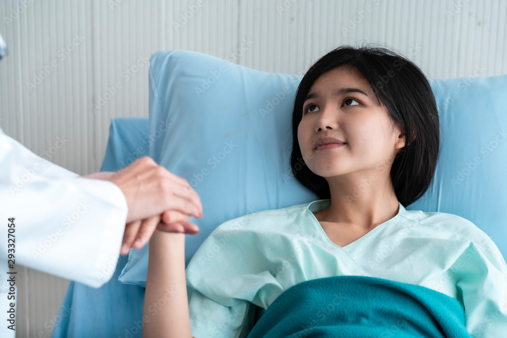 A doctor is taking care of a sick young woman with seasonal infections flu A doctor is taking care of a sick young woman with seasonal infections flu