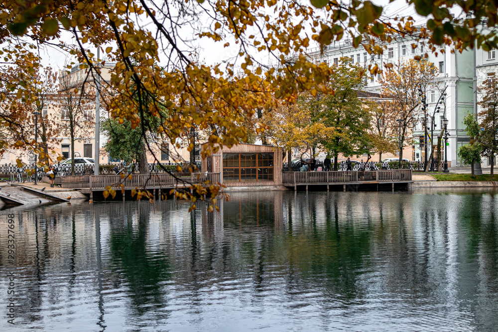 Autumn forest lake reflection landscape. Autumn pond. Beautiful fall nature.