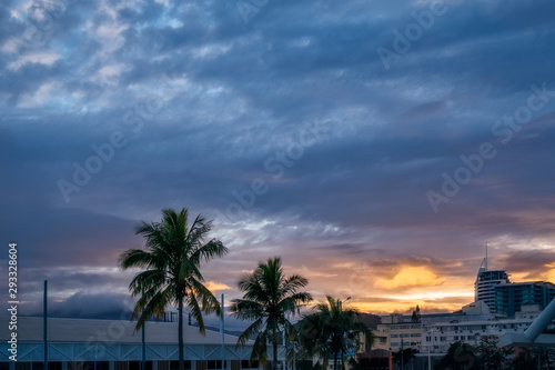 Early Morning Sunrise View -with fog lifting from mountains in the distance- from the Ferry Terminal in Noumea Port, New Caledonia, South Pacific