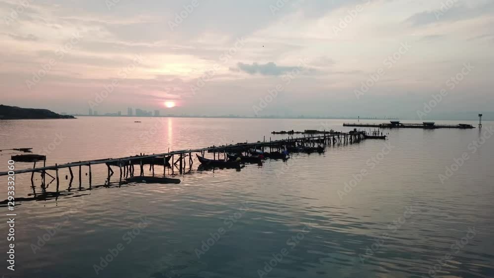 Boat parking at Jelutong fishing jetty during sunrise. Boat parking at Jelutong fishing jetty during sunrise.