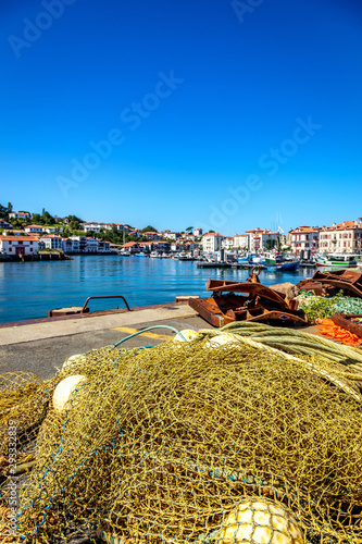 Saint-Jean-de-Luz, France - View of the harbor, houses and fishing nets