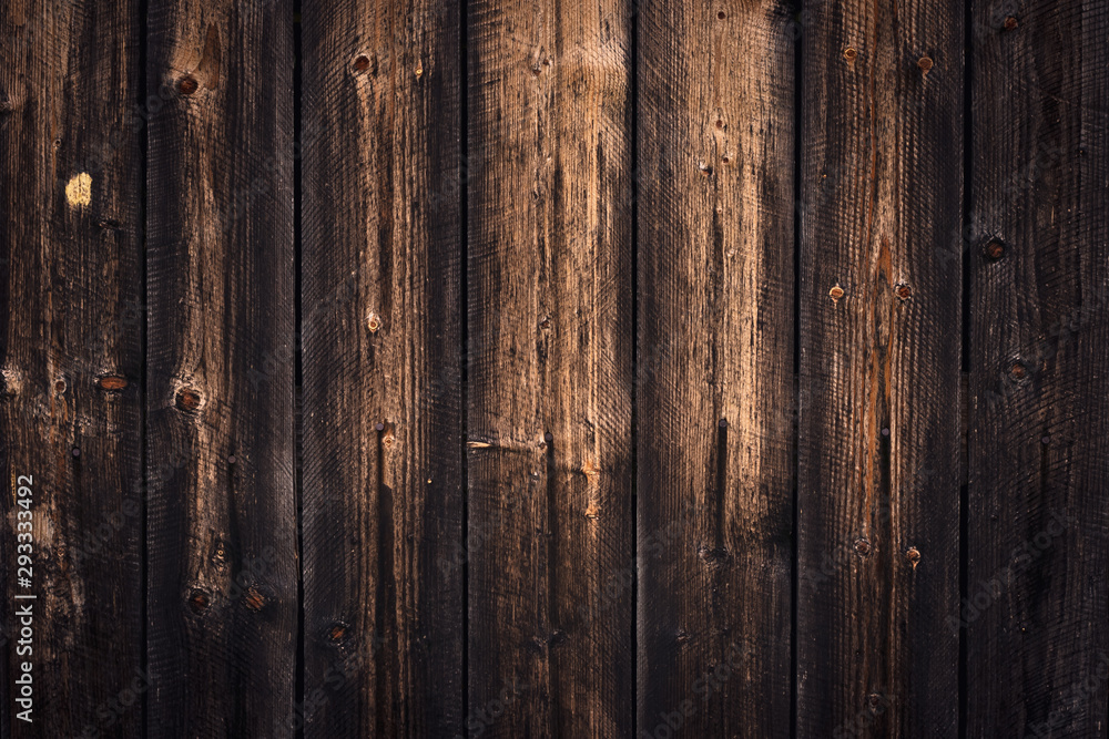 Natural wooden background. Vintage wood pattern, shabby wall texture. Dark weathered hardwood, antique boards, rough floor. Oak fence, planks. Backdrop. Retro style. Grunge, rustic timber surface. 