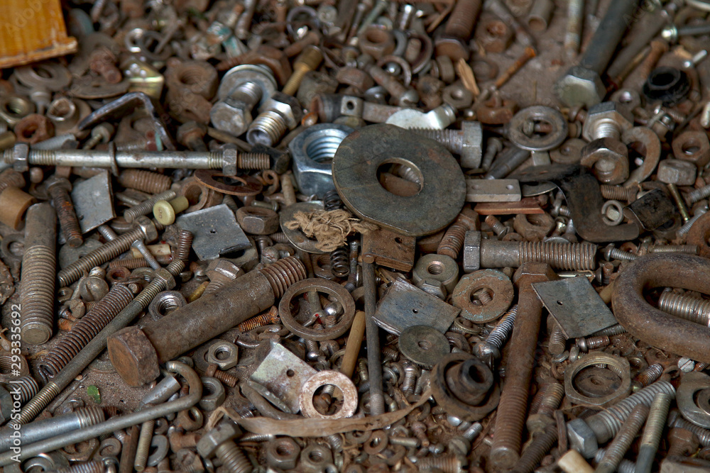 A pile of hardware nuts, bolts, washers, screws A pile of hardware nuts, bolts, washers, screws
