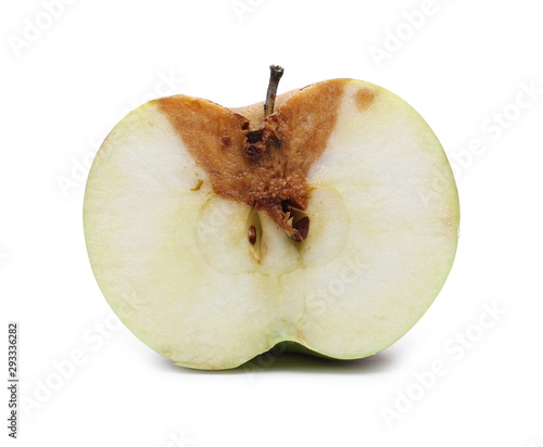 Valokuva Rotten apple sliced in half isolated on white background