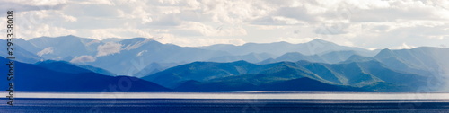 Landscape with lake and mountains in cloudy weather. Panorama of Baikal Lake © Riwkus