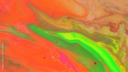 Hippie vivid colors of yellow red orange acid green pink. Flows of paint mix blur