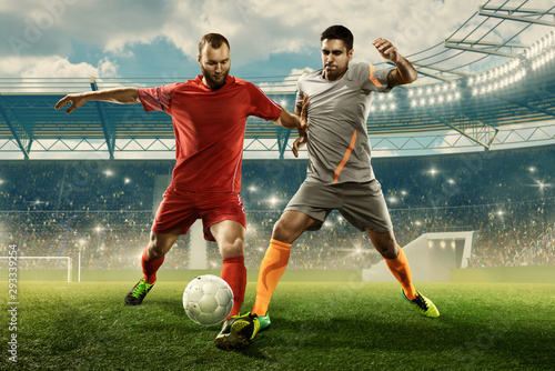 Two professional soccer players fight for the ball during the match © TandemBranding
