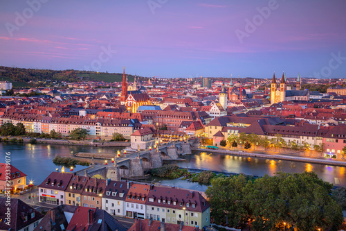 Wurzburg, Germany. Aerial cityscape image of Wurzburg with Old Main Bridge over Main river during beautiful autumn sunset.