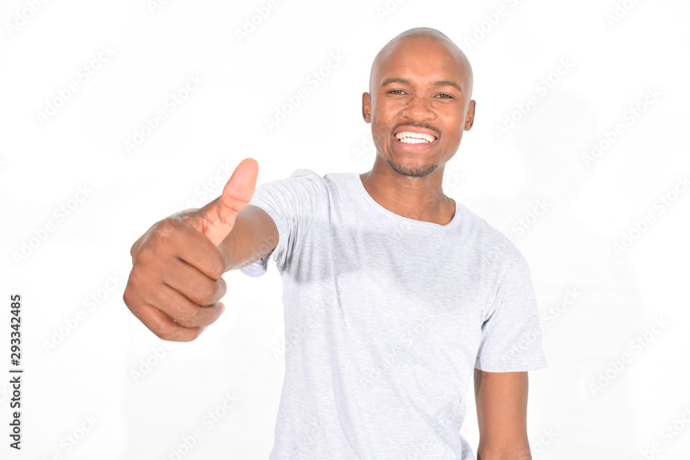 young man with thumbs up young man with thumbs up