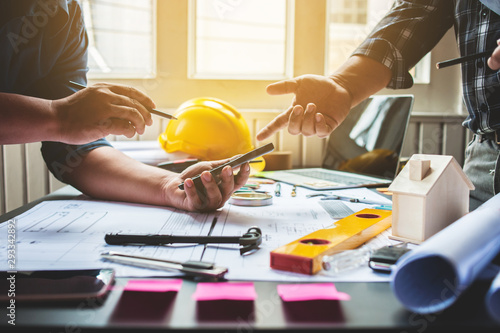 Engineers are advising contractors on road construction in housing development villages.