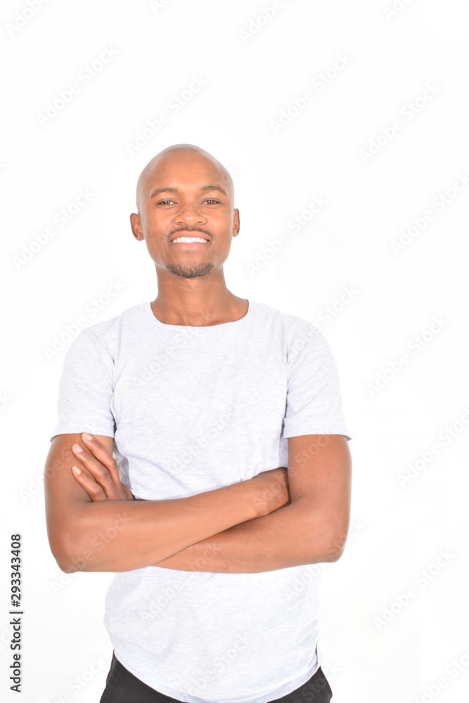 portrait of a young man with arms crossed portrait of a young man with arms crossed
