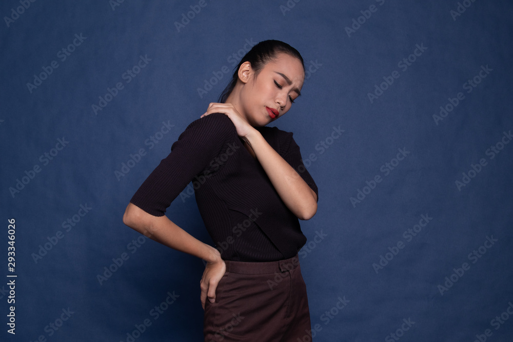 Young Asian woman got back pain. Young Asian woman got back pain.