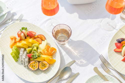 Wallpaper Mural Appetizing Sweet Orange Juice and Two Drinking Glasses standing on a white table in the kitchen for a breackfest. Healthy light meals for breakfast Torontodigital.ca