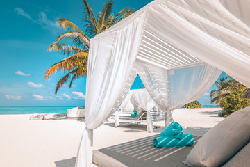 Serenity beach background, luxury beach canopy and travel or summer vacation concept. Luxury beach scene. Summer vacation and holiday concept