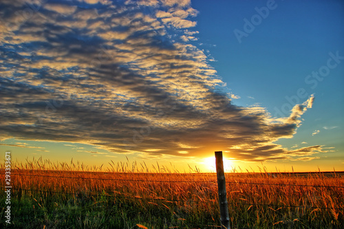 Ellis County, KS USA - A Spectacular Cloud Formation at Sunset over the Prairie Fields