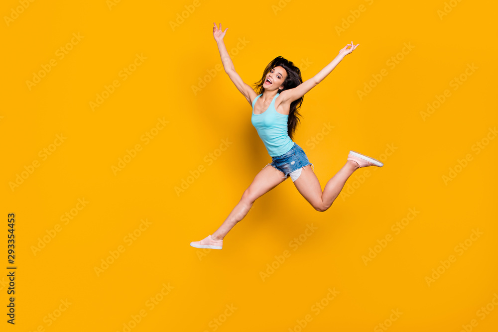Full length body size photo of excited ecstatic overjoyed teenager running quickly towards shopping mall wearing jeans denim shorts teal singlet isolated vivid color background