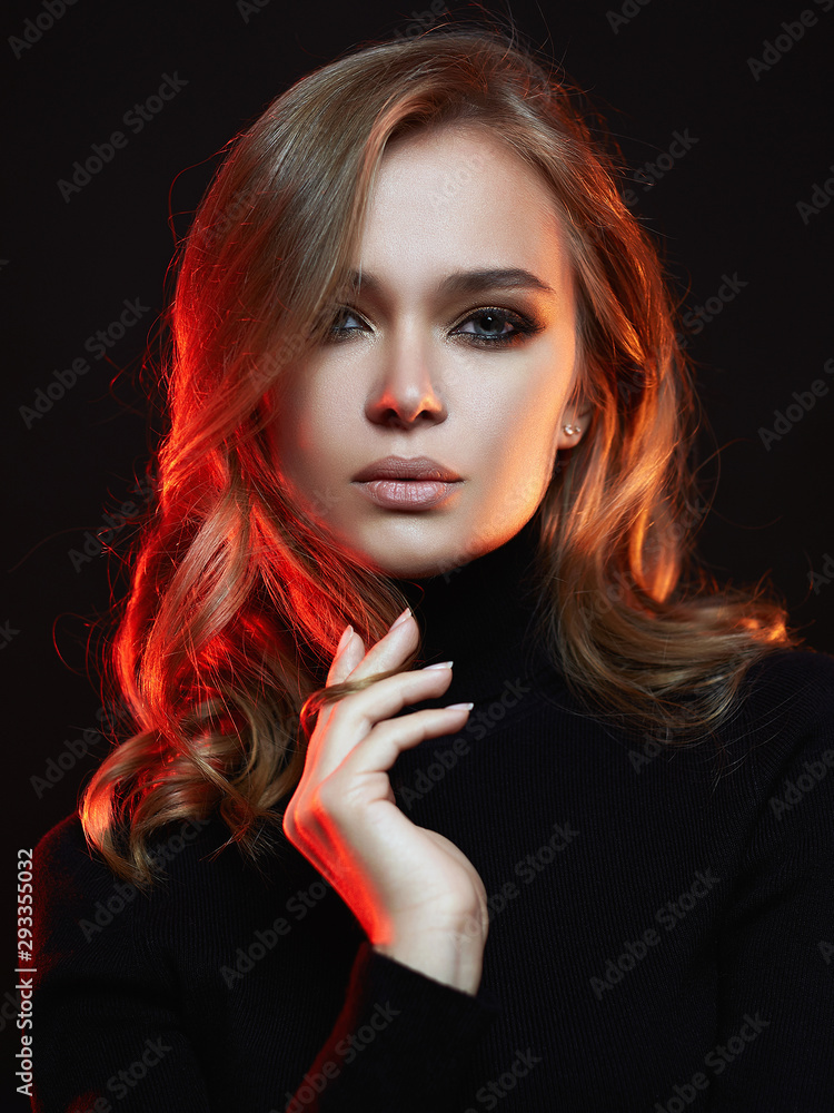 Fototapeta premium beautiful woman in color lights. colorful girl
