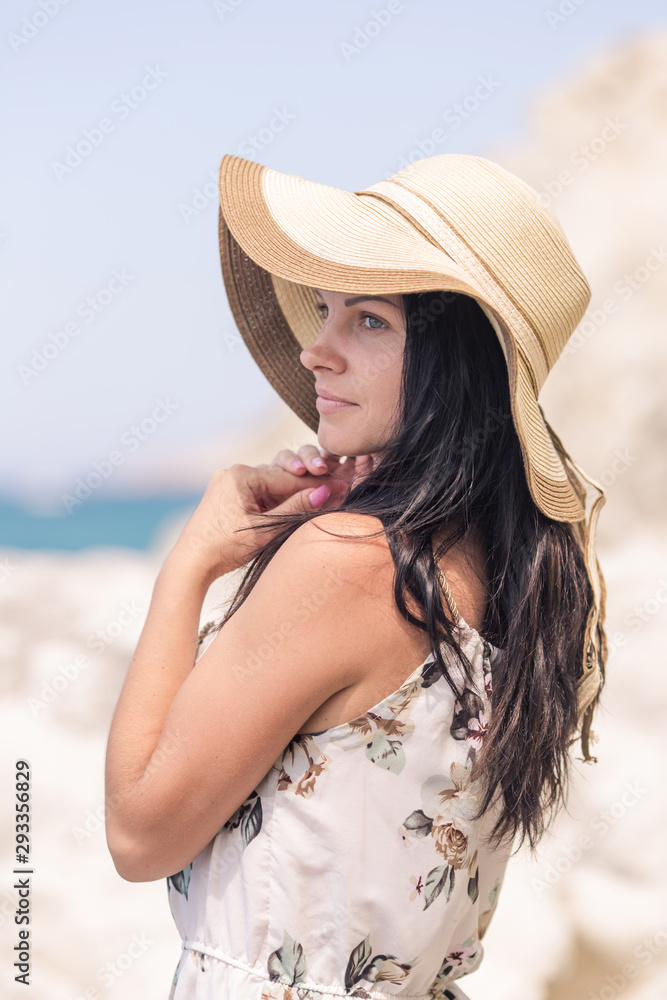 Waist-up portrait of girl at the sea