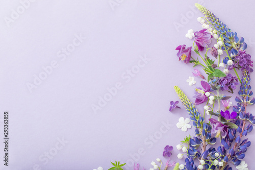 purple, blue, pink flowers on paper background