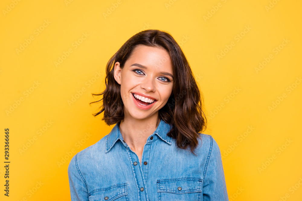 Close up photo of positive cheerful girl enjoy free time summer vacation feel rejoice wear trendy youth shirt isolated over yellow color background Close up photo of positive cheerful girl enjoy free time summer vacation feel rejoice wear trendy youth shirt isolated over yellow color background