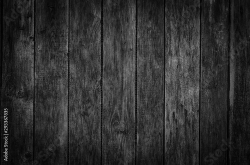 Wooden structured background in dark colors