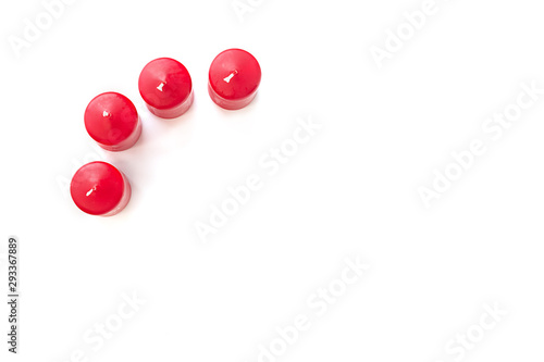 red candles on white background