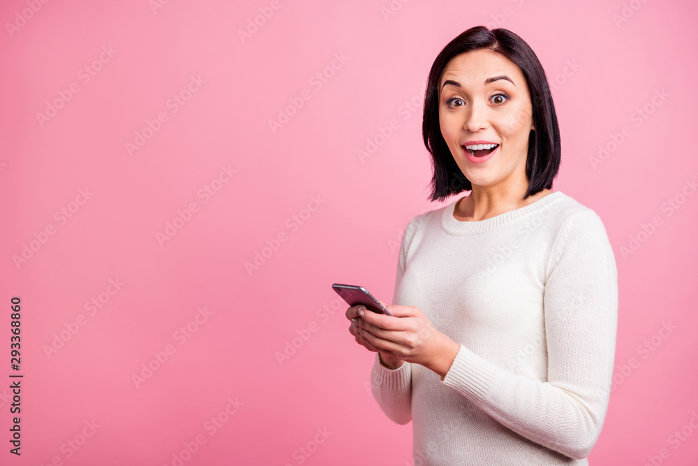 Profile photo of amazing lady holding telephone reading positive comments on new post wear white pullover isolated pink color background Profile photo of amazing lady holding telephone reading positive comments on new post wear white pullover isolated pink color background