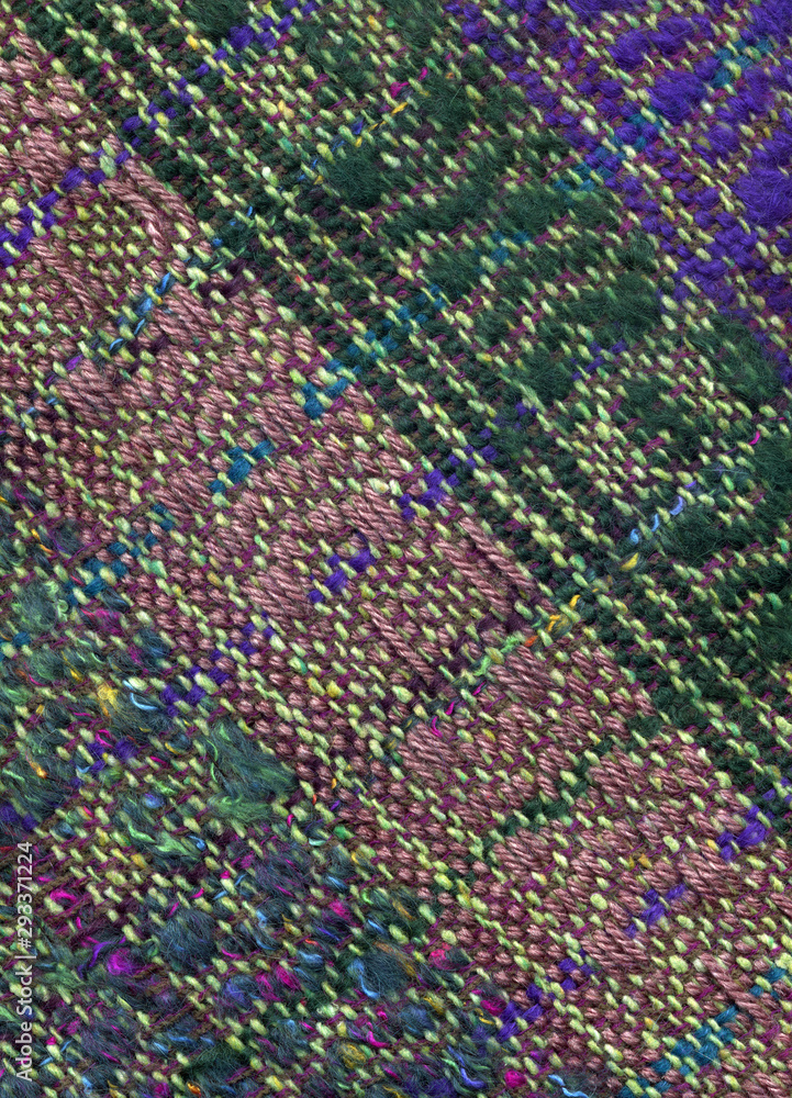 Close-up of handwoven woolen fabric with pattern Close-up of handwoven woolen fabric with pattern