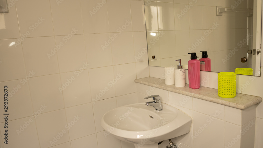 Bathroom sink in the glass background Bathroom sink in the glass background