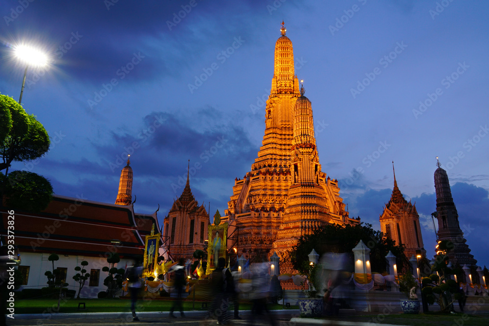 Ancient buddhism pagoda of wat Arun temple in blue hour sunset scene time sky, famous landmark of Bangkok, Thailand, southeast asia.