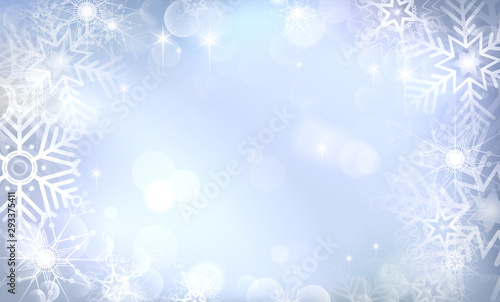 Blue winter background with abstract snowflakes and shines