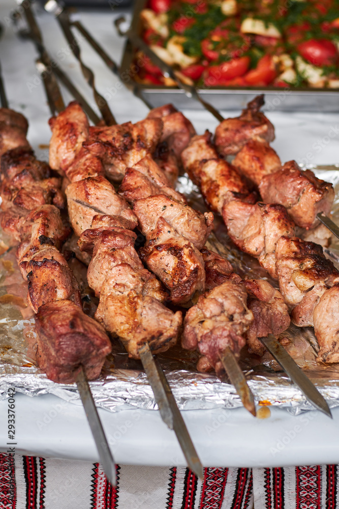 barbecue meat on skewers. grilled meat on open grill. street food barbecue meat on skewers. grilled meat on open grill. street food