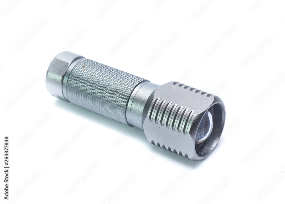 Metal flashlight over white background Metal flashlight over white background