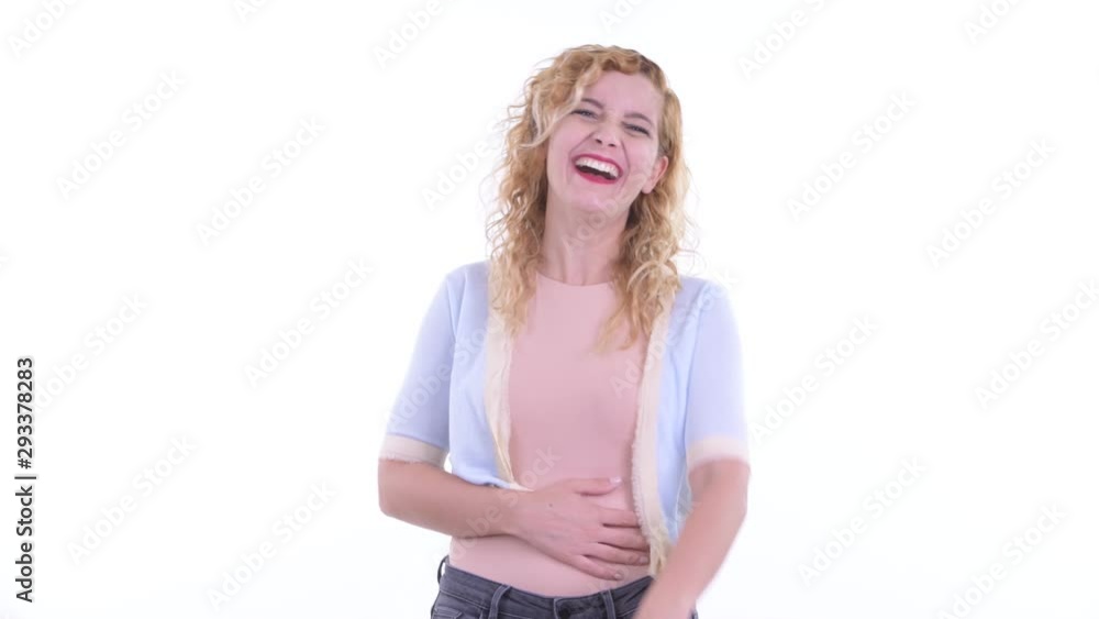 Happy beautiful blonde woman laughing and pointing at camera Happy beautiful blonde woman laughing and pointing at camera