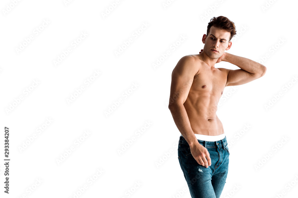 sexy man in jeans touching neck isolated on white